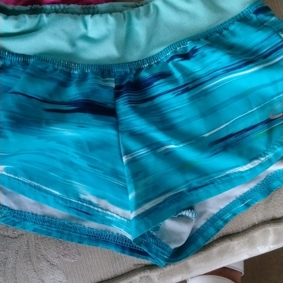 Kids pink apple bottom shorts and a little pill turquoise pair of shorts - Picture 3 of 4